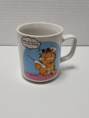 Vintage Garfield Ceramic Mug with Fun Nurse Illustration